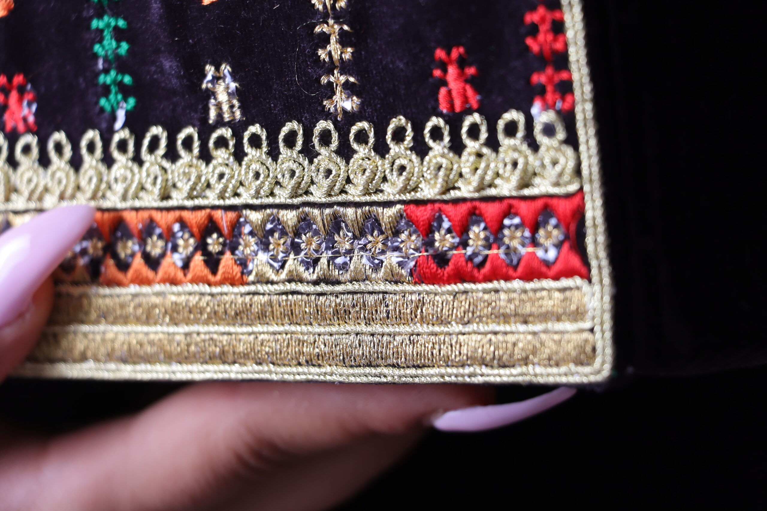 black embroidered bag with takhlila theme